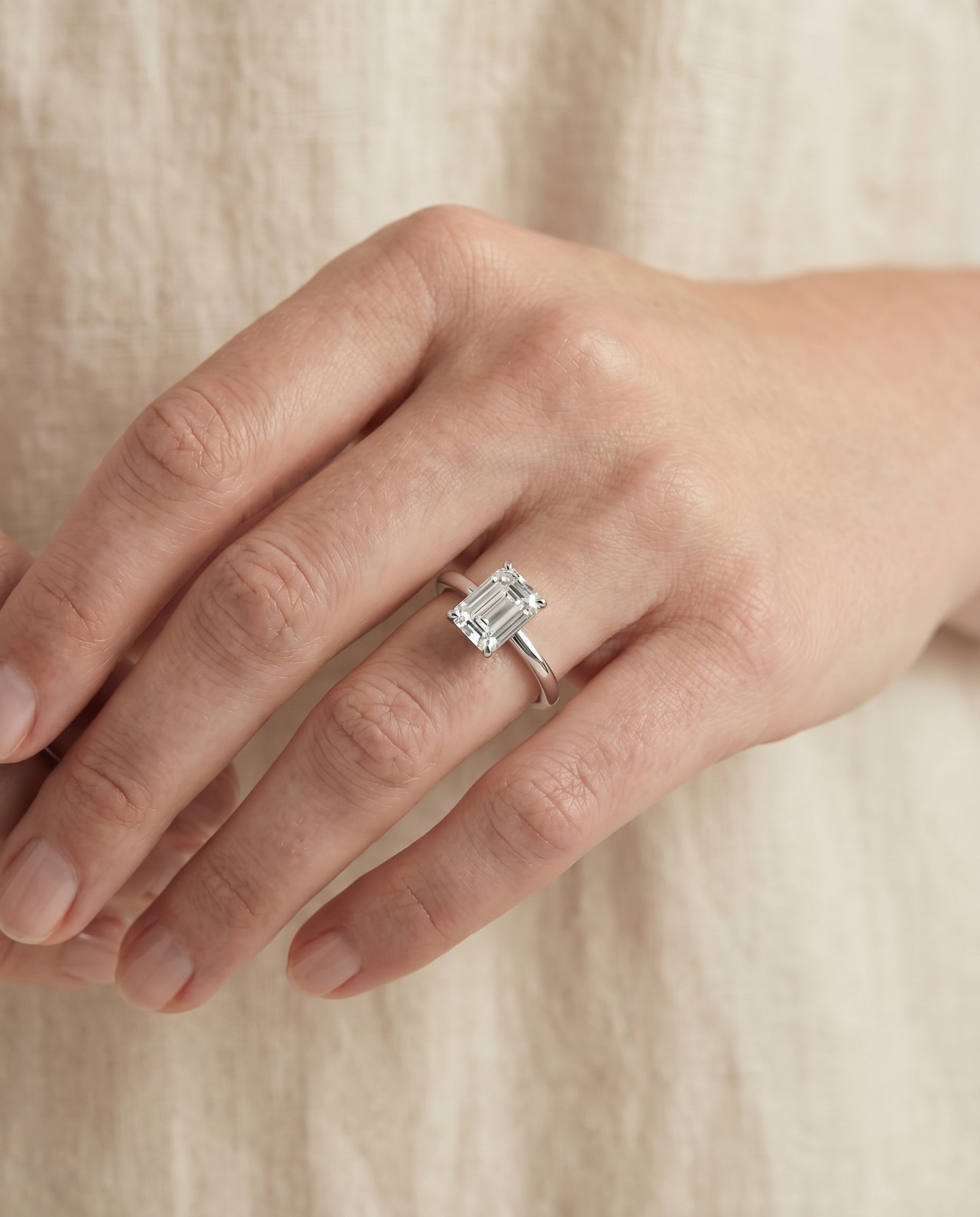 The Floria engagement ring setting in 18K White Gold, comfort fit claw prong solitaire cut design | RockHer