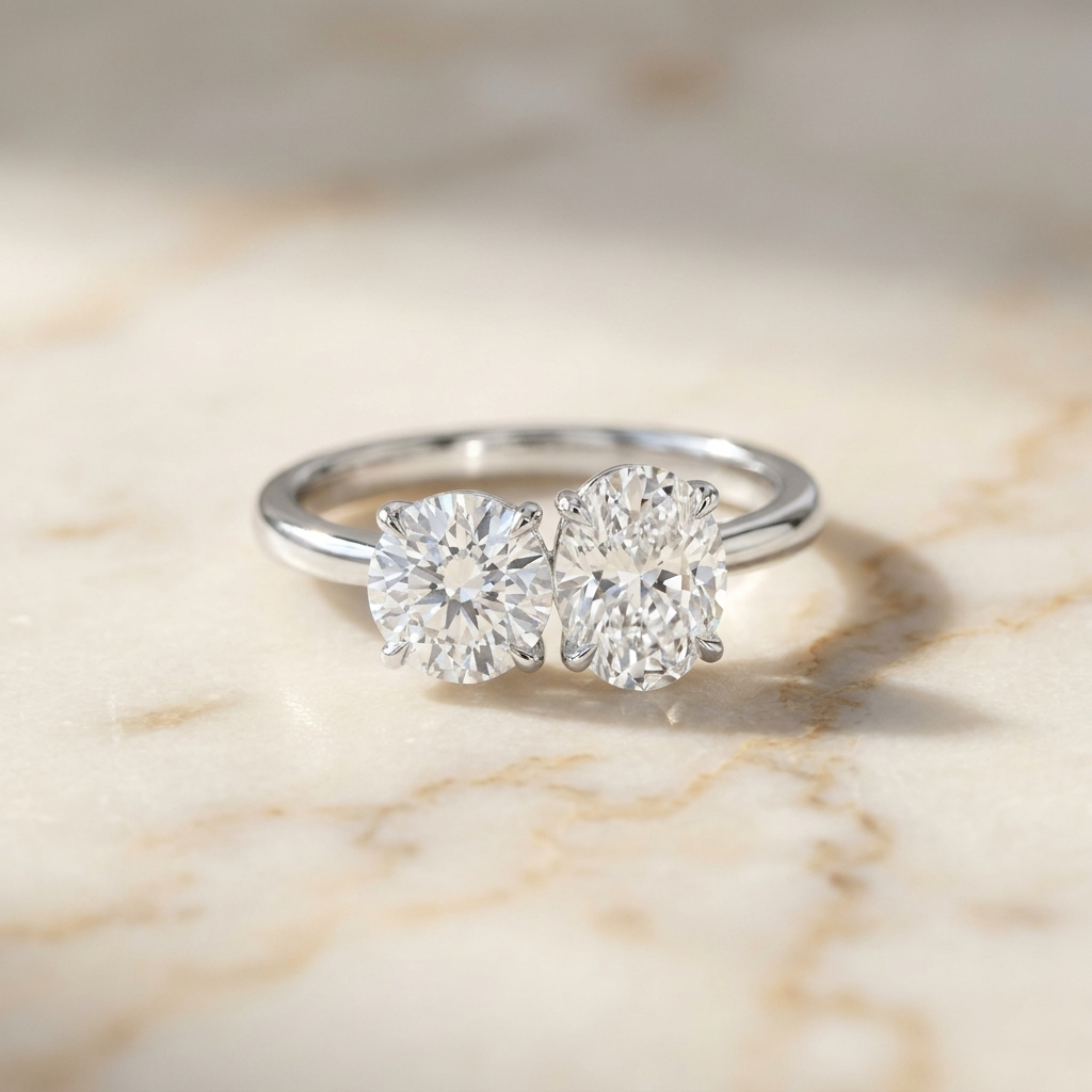 18K White Gold Sasha Toi et Moi Select Round & Oval Lab Diamond Engagement Ring - Hero on warm marble