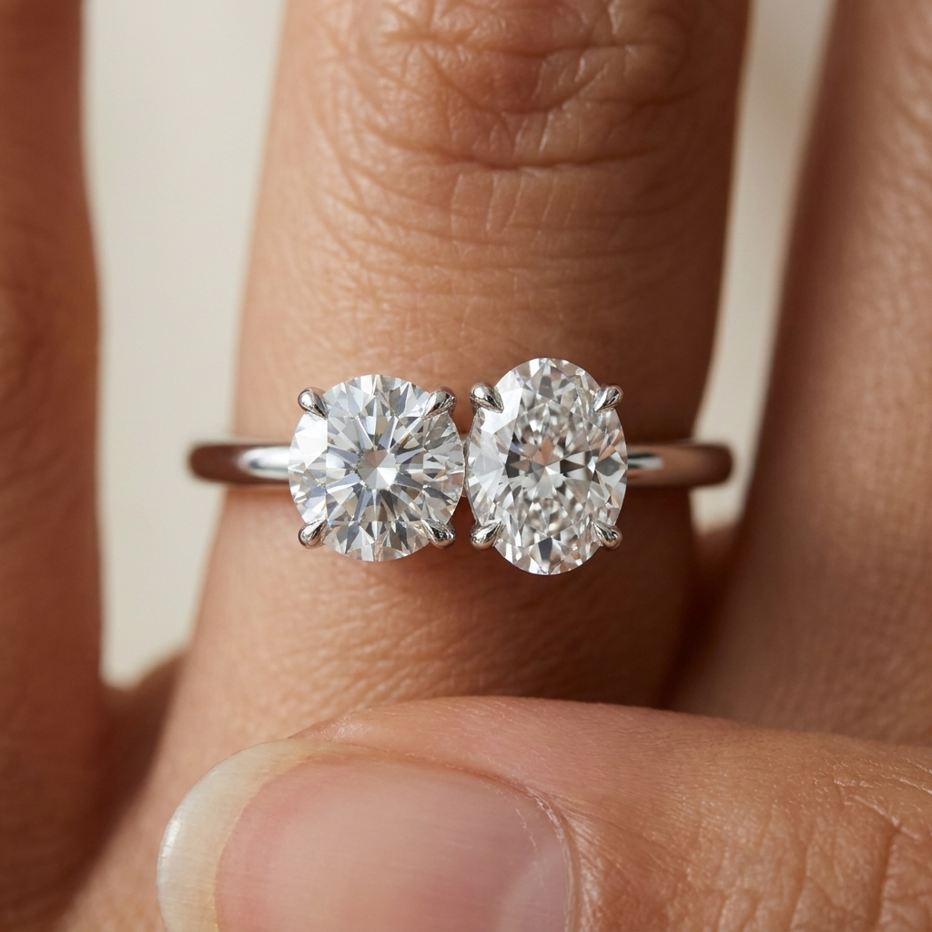 18K White Gold Sasha Toi et Moi Select Round & Oval Lab Diamond Engagement Ring - Macro close-up on finger