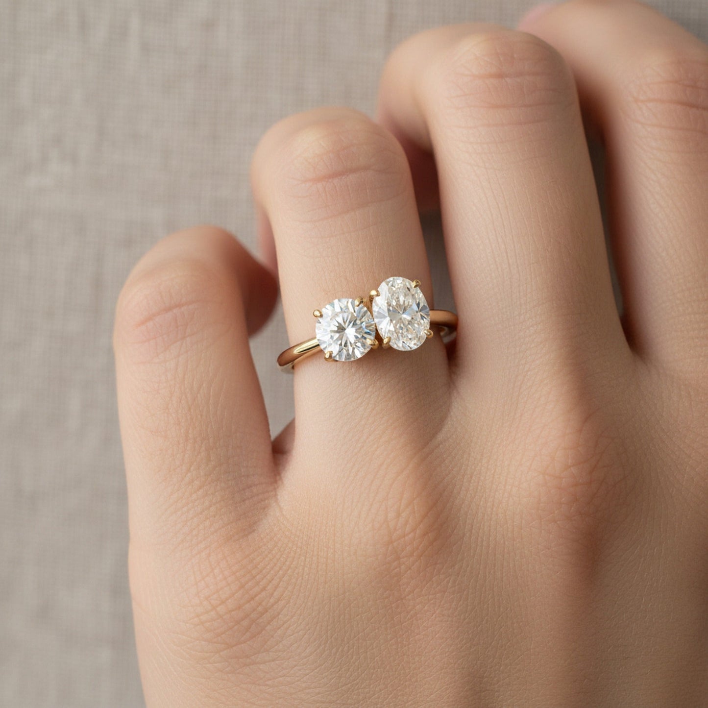 Sasha Toi et Moi Round & Oval engagement ring setting worn on hand