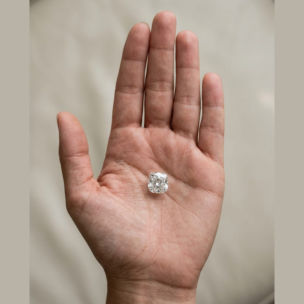 1-1/4 Carat Cushion Lab Grown Diamond, true-scale on open palm