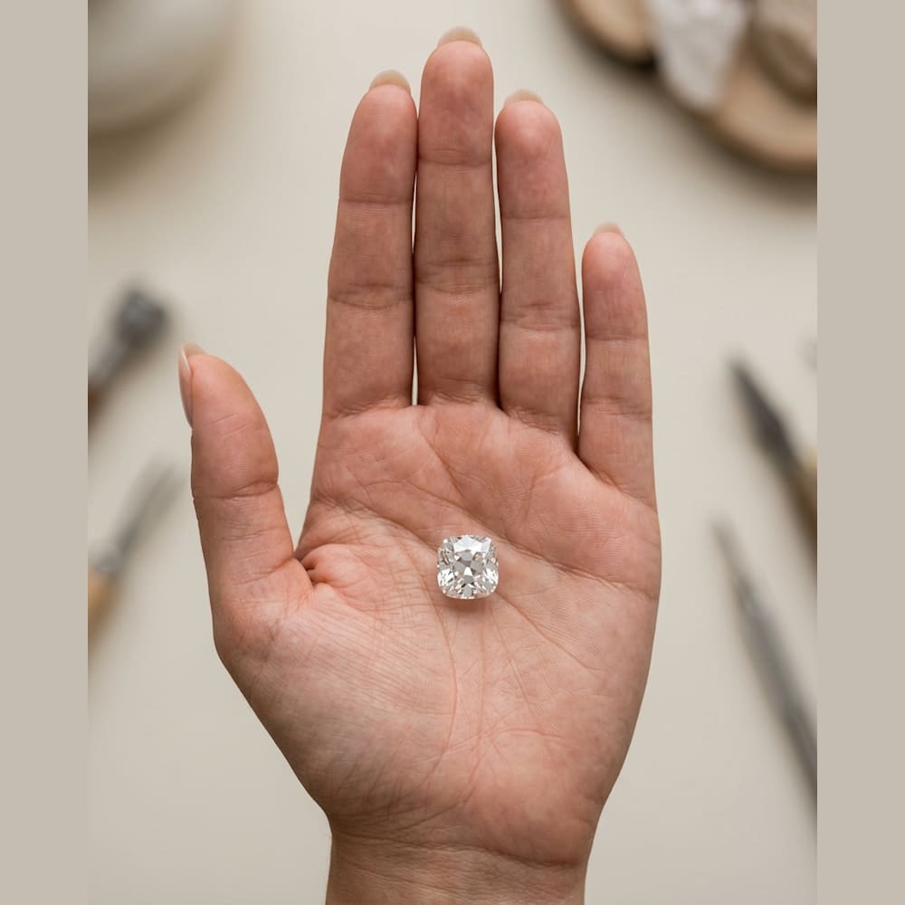 1-1/2 Carat Cushion Lab Grown Diamond, true-scale on open palm