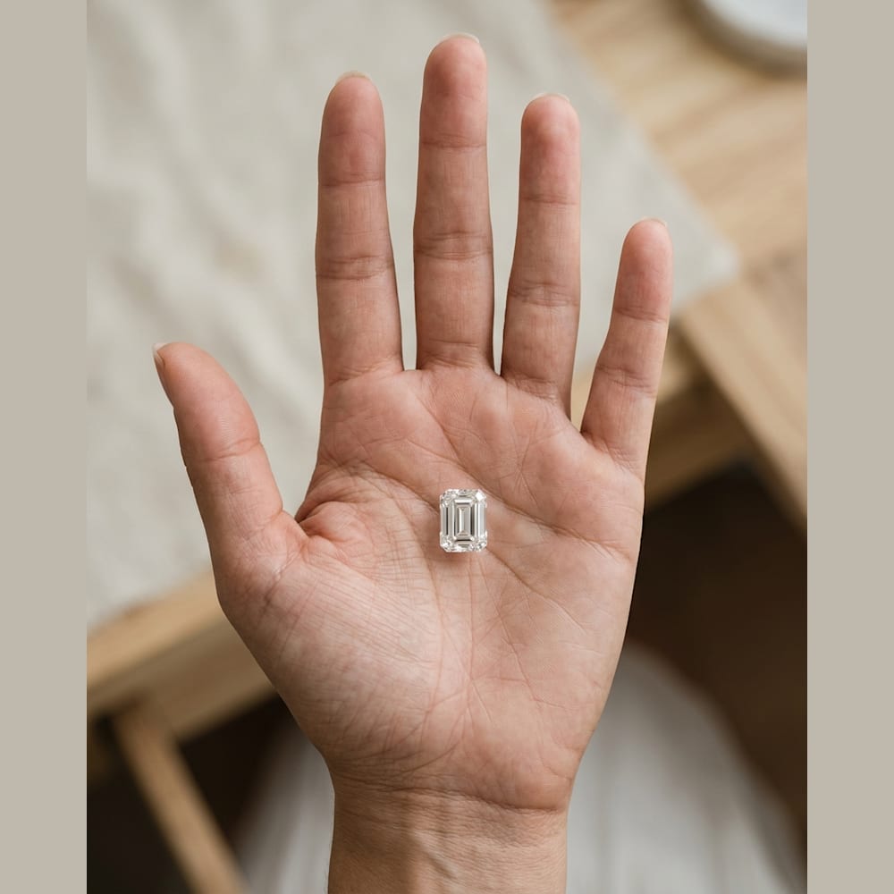 1-1/2 Carat Emerald Lab Grown Diamond, true-scale on open palm