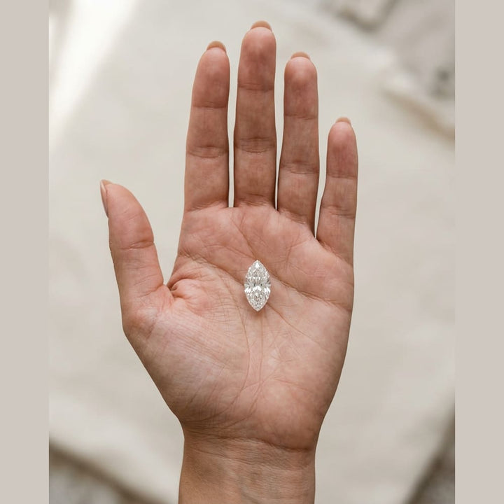 1-1/2 Carat Marquise Lab Grown Diamond — true-scale on open palm