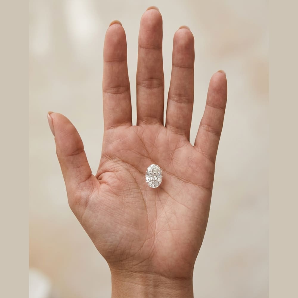 1 Carat Oval Lab Grown Diamond, true-scale on open palm