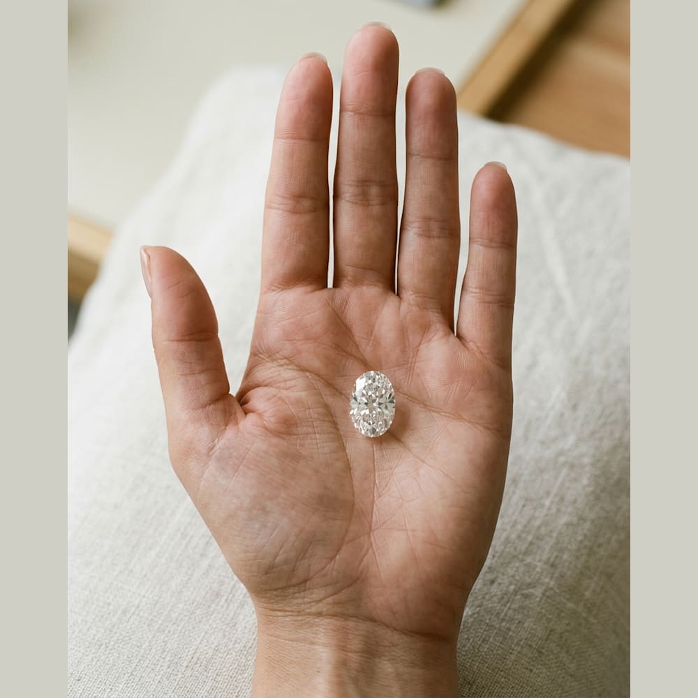 2 Carat Oval Lab Grown Diamond, true-scale on open palm