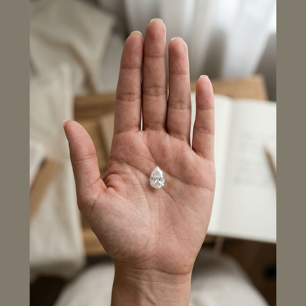 1 Carat Pear Lab Grown Diamond, true-scale on open palm