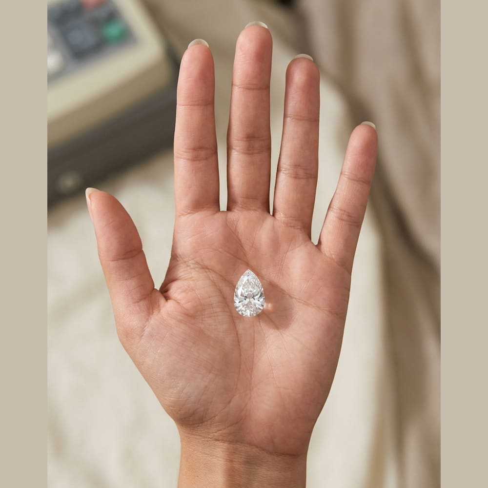 1-3/4 Carat Pear Lab Grown Diamond, true-scale on open palm