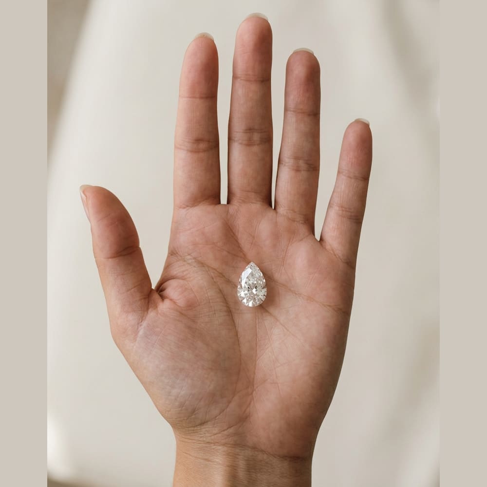 2 Carat Pear Lab Grown Diamond, true-scale on open palm