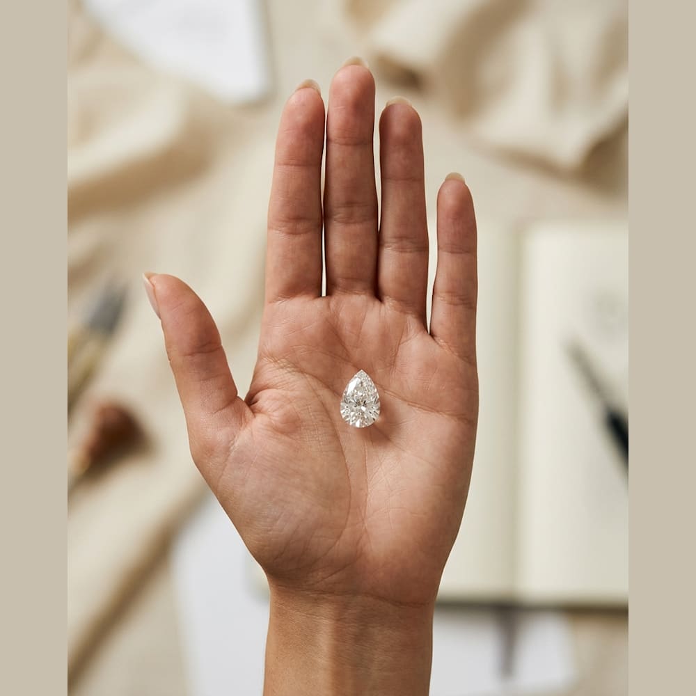 2-1/2 Carat Pear Lab Grown Diamond, true-scale on open palm