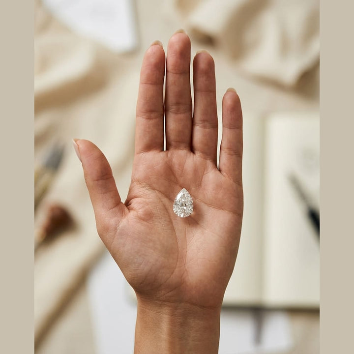2-1/2 Carat Pear Lab Grown Diamond — true-scale on open palm