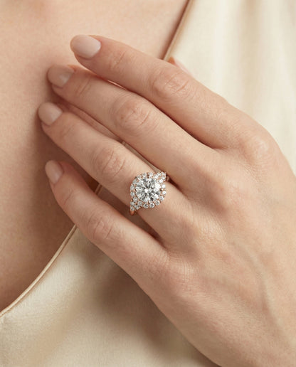 Kai Select scroll gallery halo round ring in 14K Rose Gold — on hand angled — RockHer