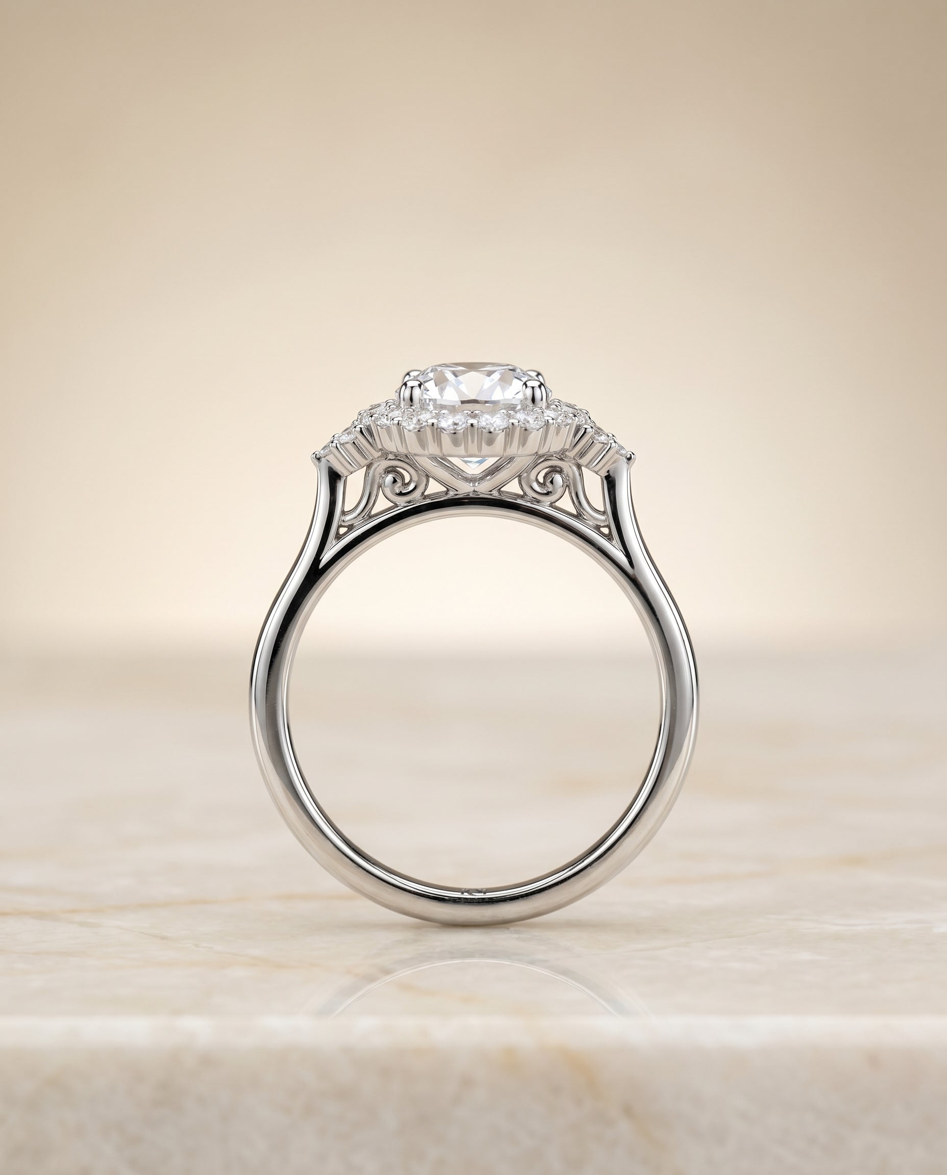 Scroll Gallery Halo styling on The Kai round engagement ring setting | RockHer