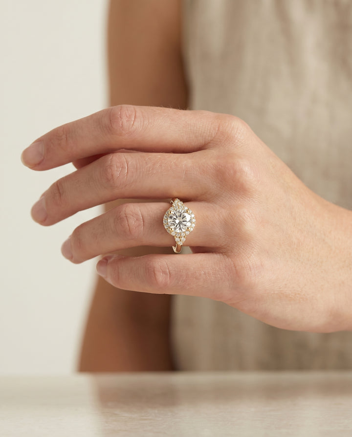 Round Brilliant, Scroll Gallery Halo, in 18K Yellow Gold, pave setting – lifestyle shot | RockHer