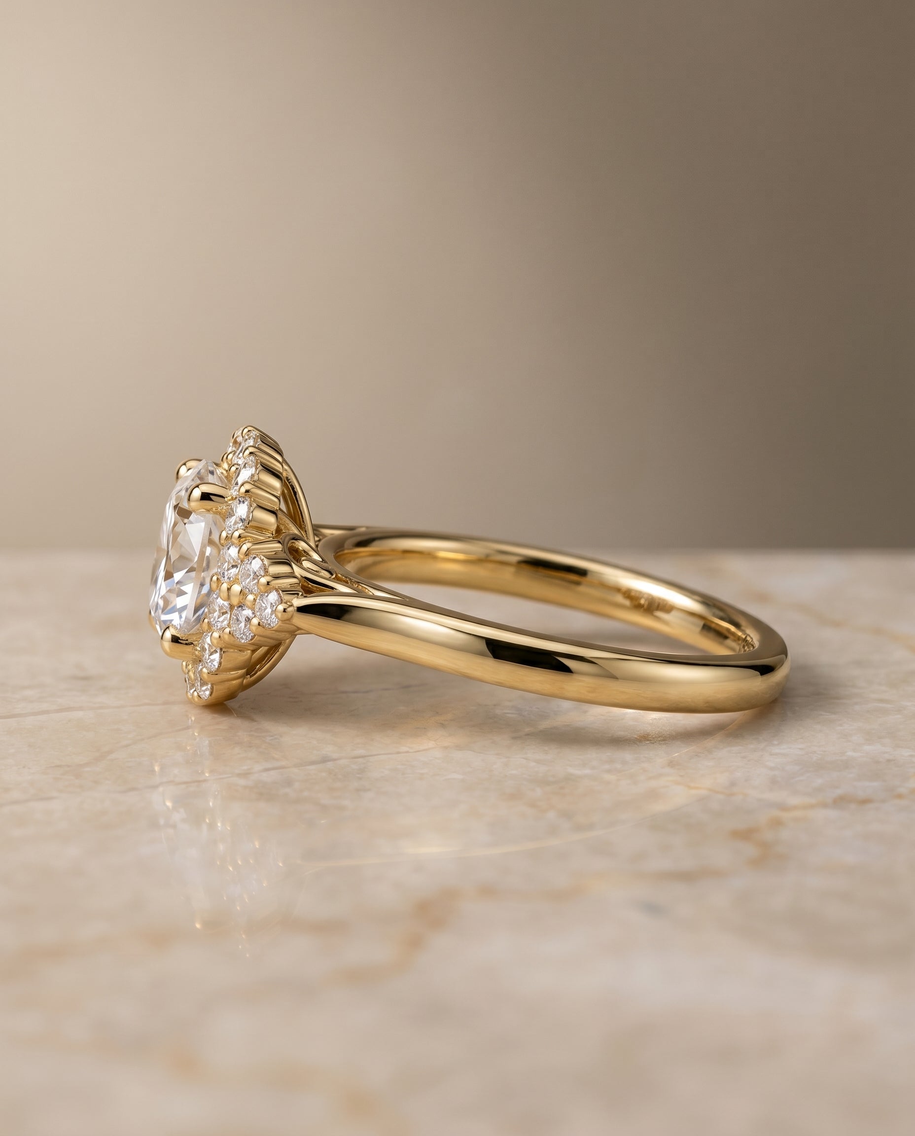 The Kai scroll gallery halo engagement ring setting, shown in 18K Yellow Gold | RockHer
