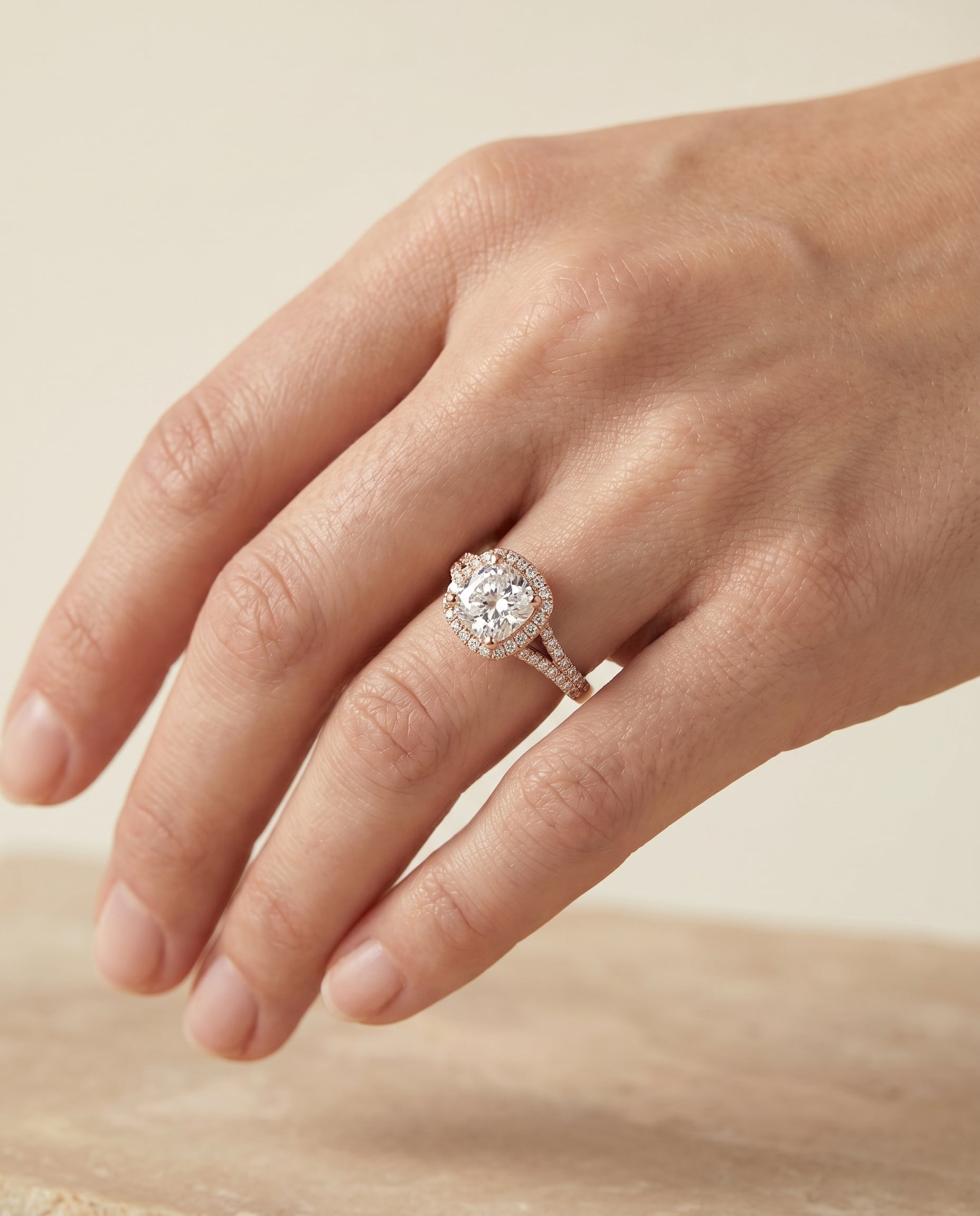 The Vega engagement ring setting in 14K Rose Gold, scroll gallery split shank halo cut design | RockHer