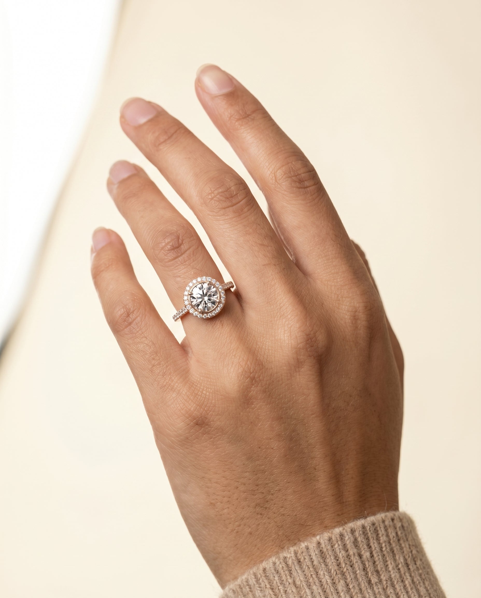 The Lucia engagement ring setting in 14K Rose Gold, secret gallery french pavé halo design | RockHer