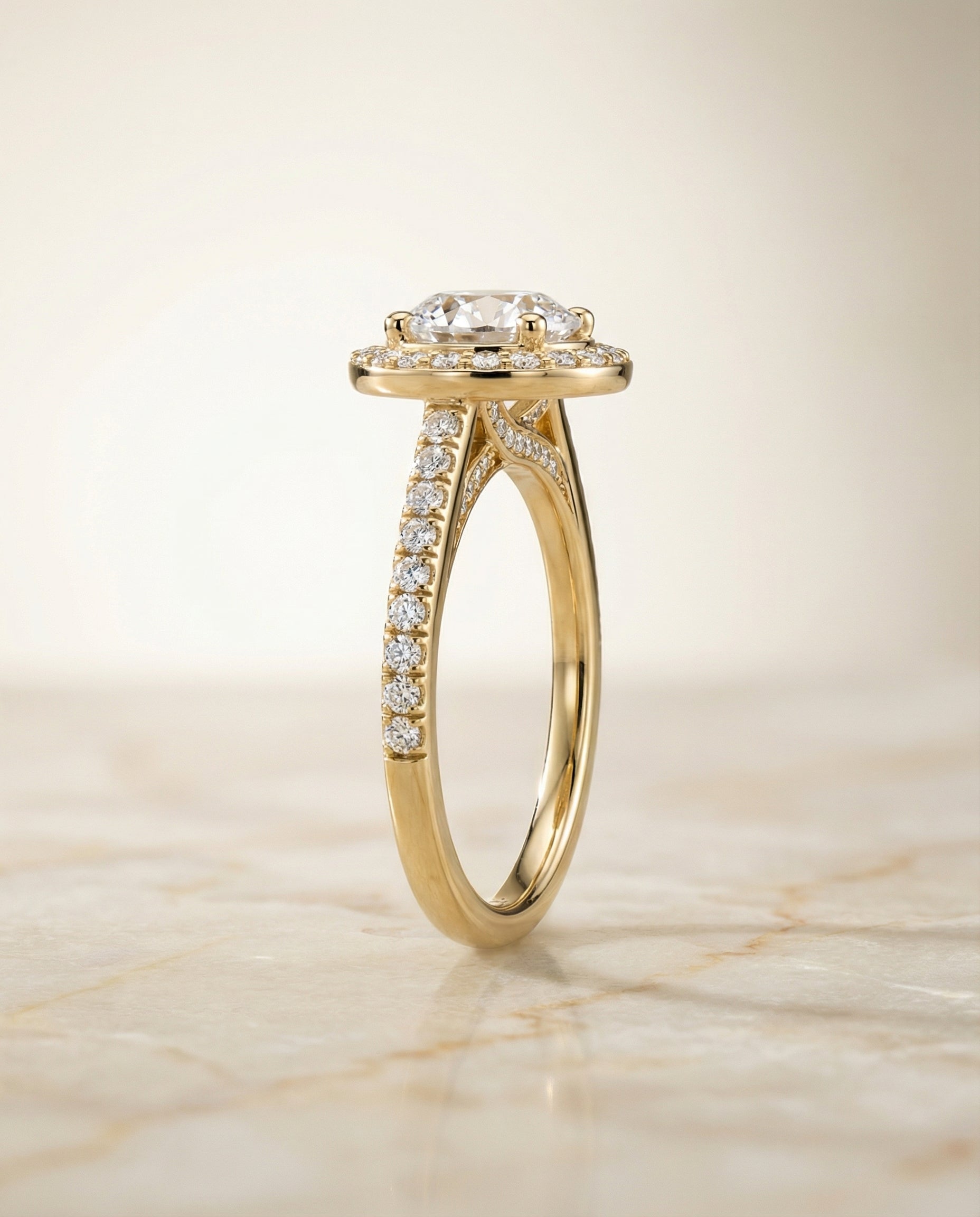 The Lucia engagement ring setting in 18K Yellow Gold, secret gallery french pavé halo design | RockHer