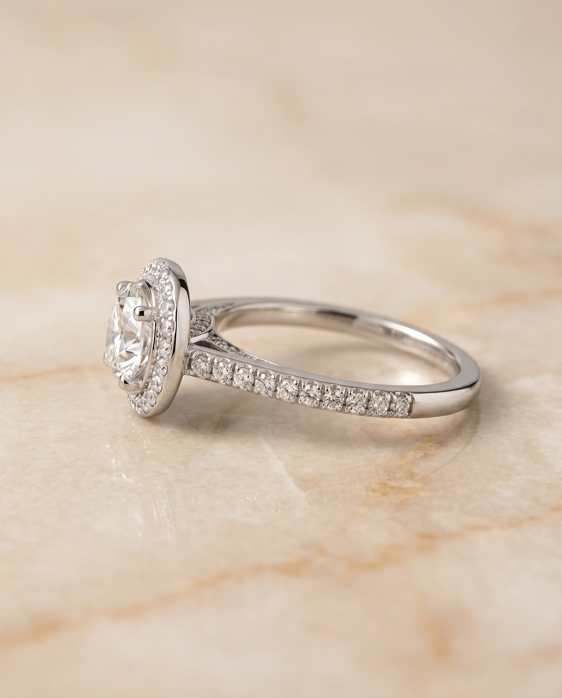 Secret Gallery French Pavé Halo styling on The Lucia round engagement ring setting | RockHer