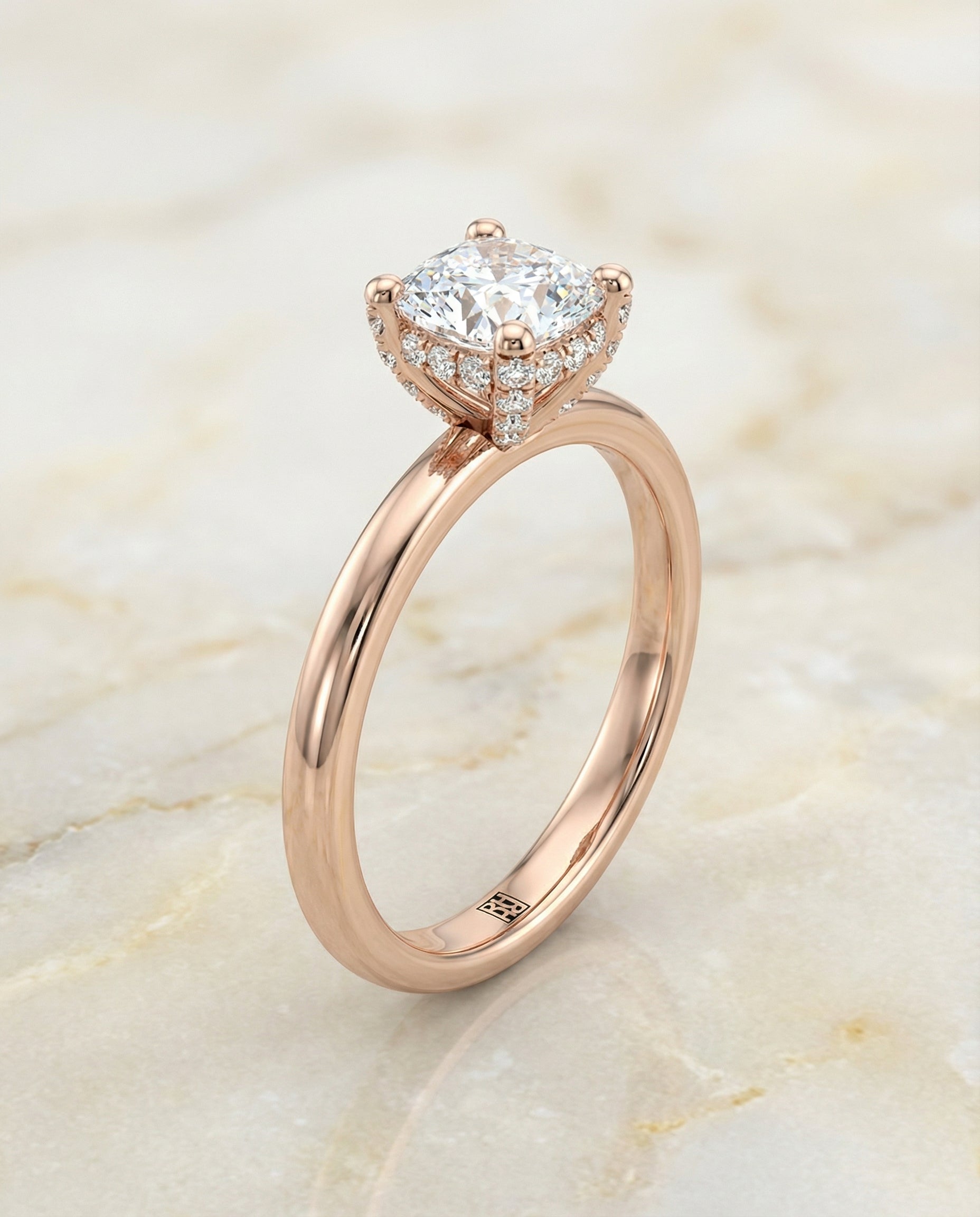 Secret Halo Adorned Prong Solitaire Cut styling on The Lana cushion engagement ring setting | RockHer