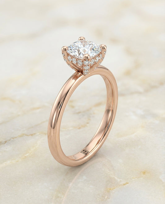 Lana Select secret halo adorned prong solitaire cushion ring in 14K Rose Gold — front — RockHer