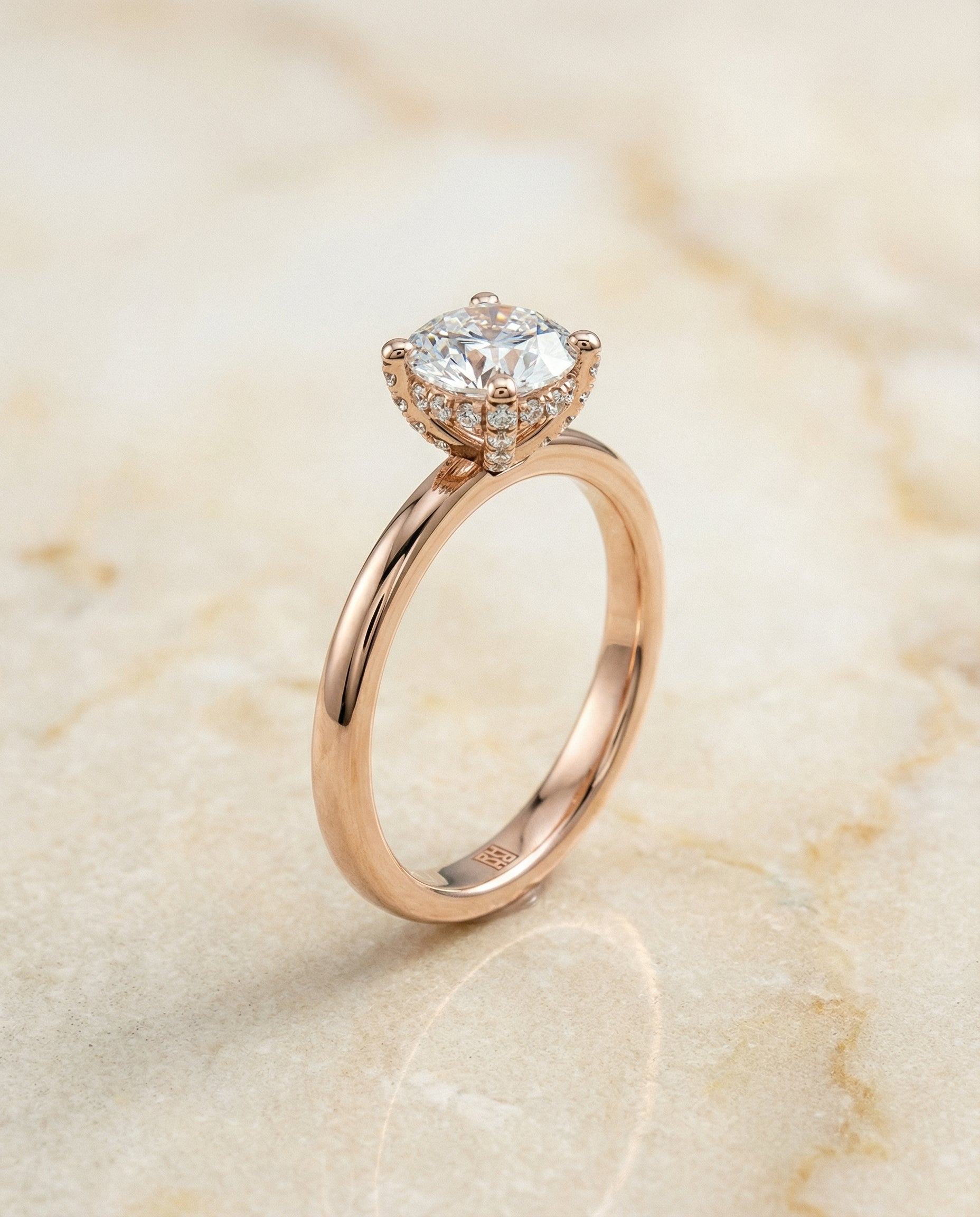 Lana Select Secret Halo Adorned Prong Solitaire Round Lab Diamond Engagement Ring in 14K Rose Gold, front view | RockHer