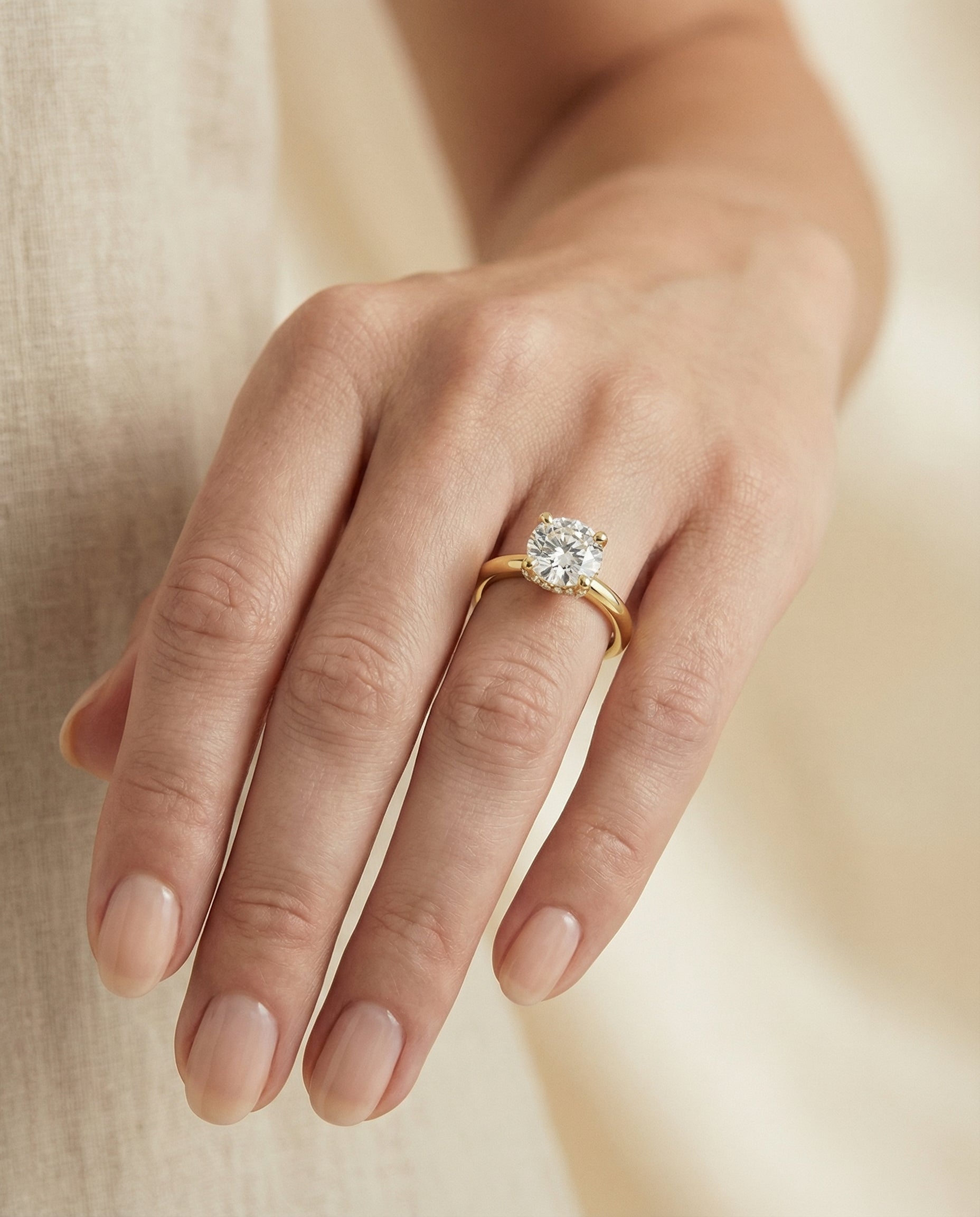 The Lana setting for round diamonds, made to order in 18K Yellow Gold | RockHer