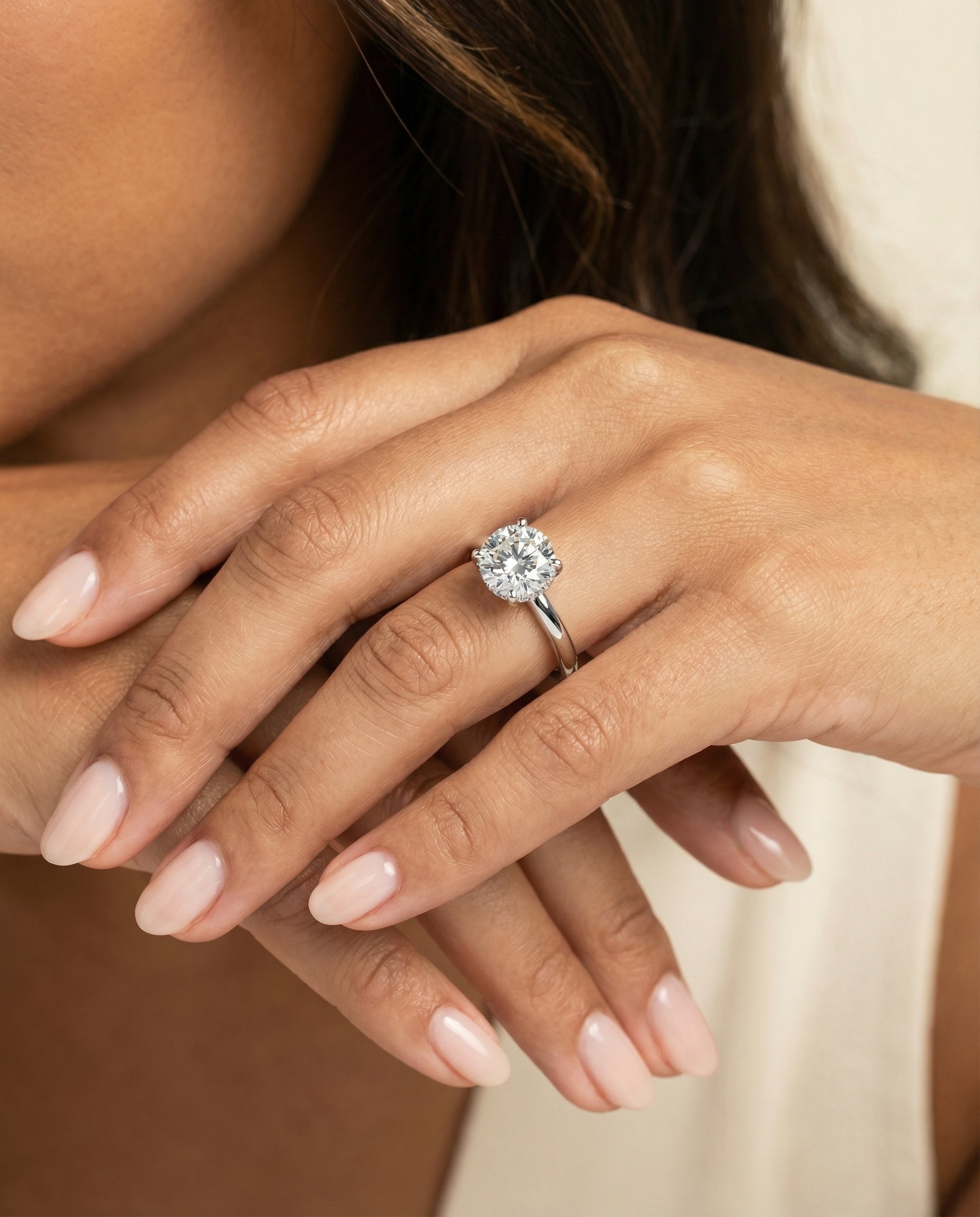 The Lana engagement ring setting in Platinum, secret halo adorned prong solitaire design | RockHer