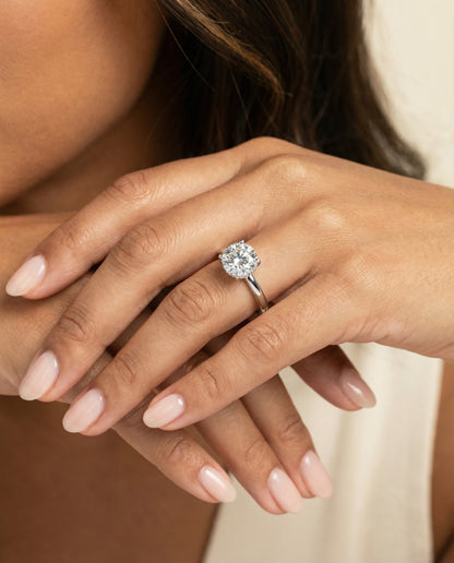 Round Brilliant, Secret Halo Adorned Prong Solitaire, in Platinum – lifestyle shot | RockHer