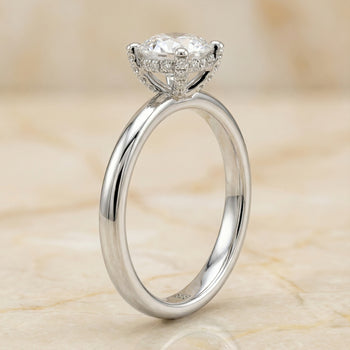 The Lana Secret Halo Adorned Prong Solitaire Round Engagement Ring Setting in Platinum