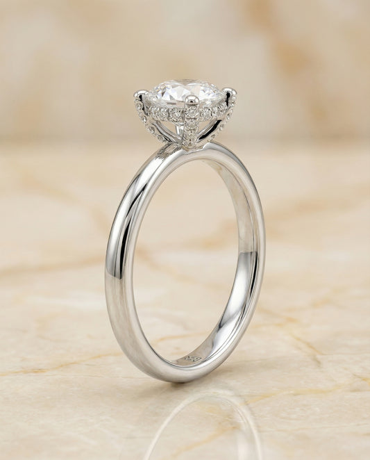 Secret Halo Adorned Prong Solitaire Engagement Ring Setting in Platinum