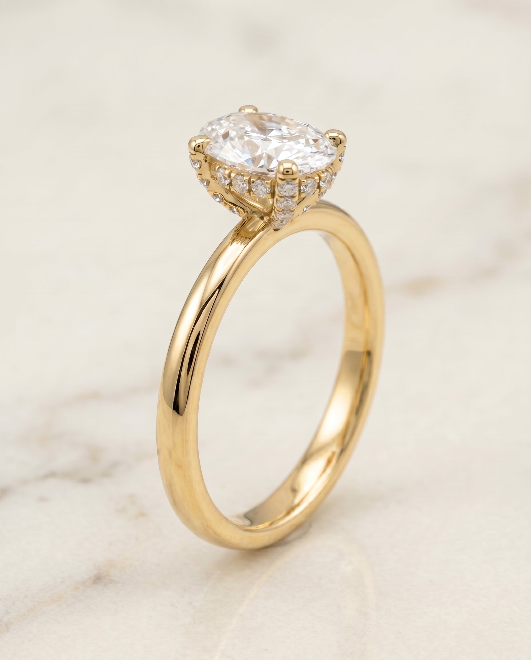 Secret Halo Adorned Prong Solitaire styling on The Lana oval engagement ring setting | RockHer