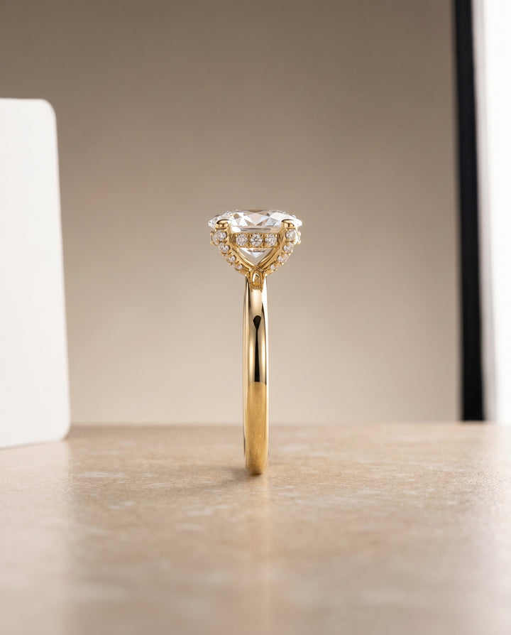 Secret Halo Adorned Prong Solitaire Oval in 18K Yellow Gold