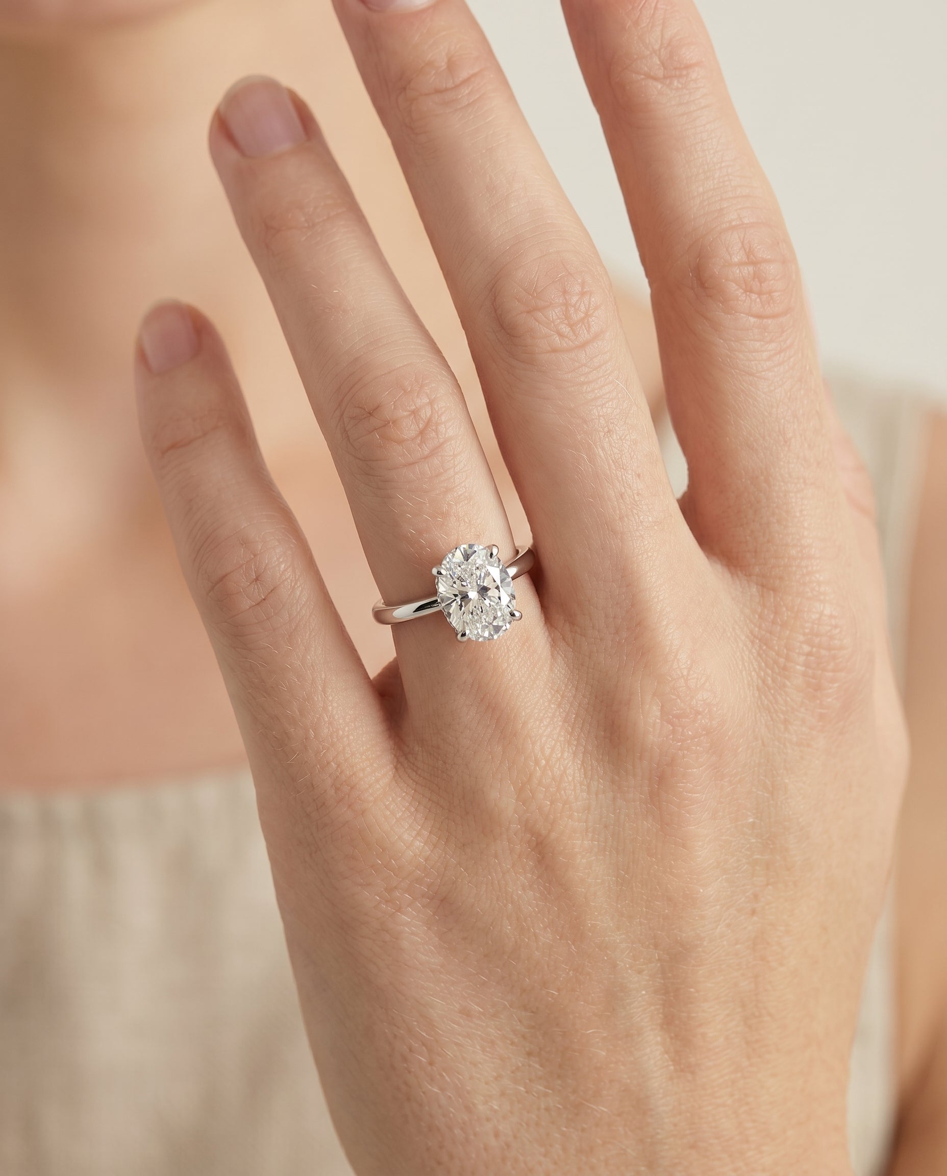 The Lana engagement ring setting in Platinum, secret halo adorned prong solitaire design | RockHer