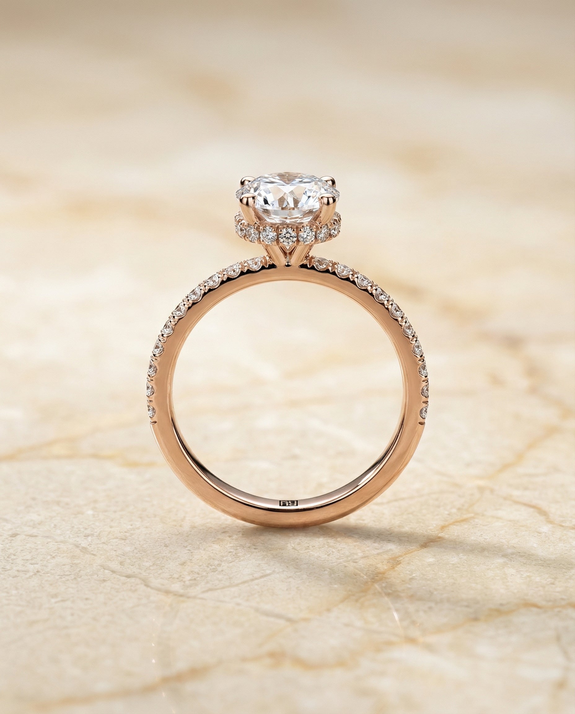 The Elliott hidden halo pavé engagement ring setting, shown in 14K Rose Gold | RockHer