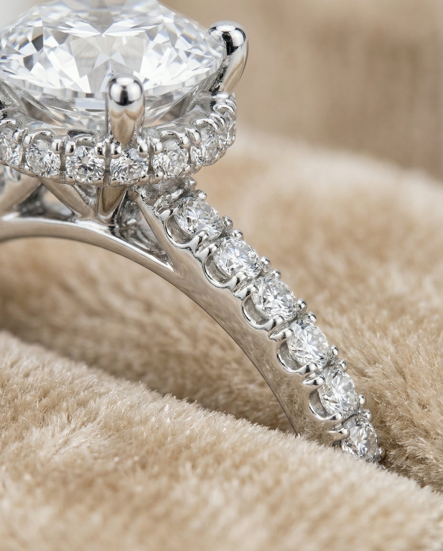 Round Brilliant, Secret Halo French Pavé Solitaire, in Platinum – detail view | RockHer