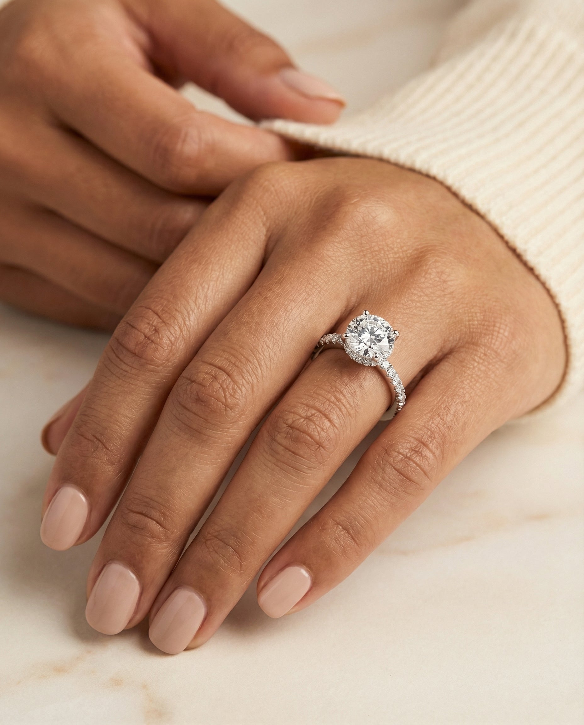 The Elliott setting for round diamonds, made to order in Platinum | RockHer