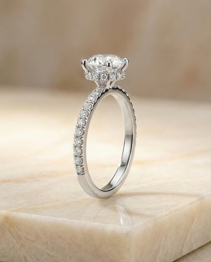 Round Brilliant, Secret Halo French Pavé Solitaire, in Platinum – side profile | RockHer