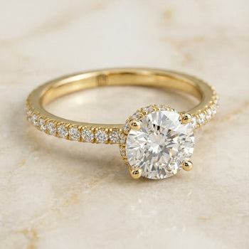 The Elliott Hidden Halo Pavé Round Engagement Ring Setting in 18K Yellow Gold