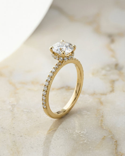 Elliott Select secret halo french pavé solitaire round ring in 14K Yellow Gold — front — RockHer