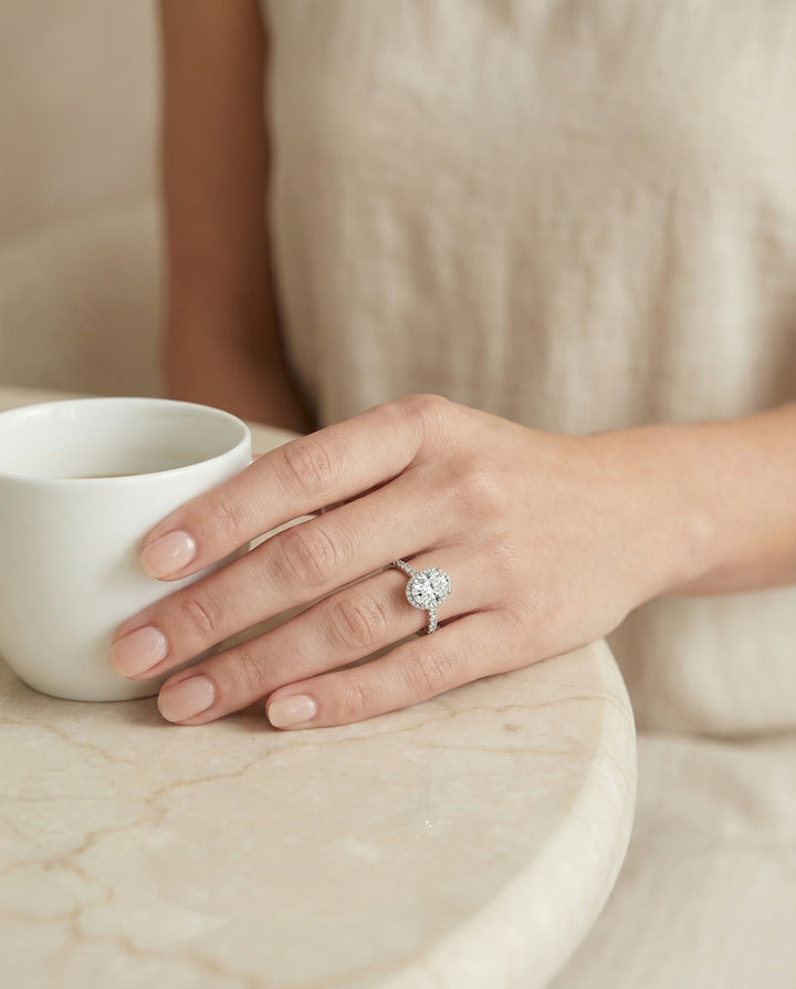 The Elliott — Secret Halo French Pavé Solitaire Oval in 14K White Gold