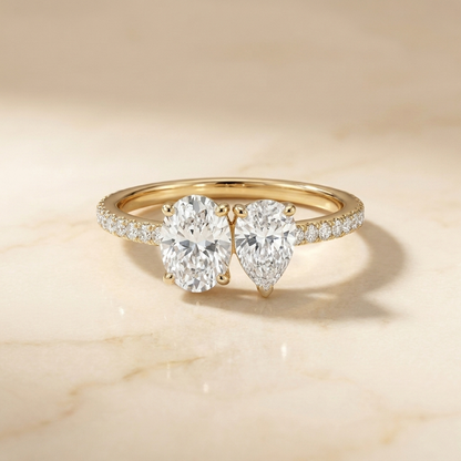 14K Yellow Gold Selena Select Toi et Moi Oval & Pear Pavé Band Lab Diamond Engagement Ring - Hero on warm marble
