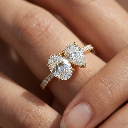 18K Yellow Gold Selena Select Toi et Moi Oval & Pear Pavé Band Lab Diamond Engagement Ring - Macro close-up on finger