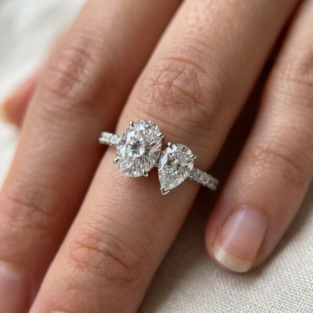 Platinum Selena Select Toi et Moi Oval & Pear Pavé Band Lab Diamond Engagement Ring - Macro close-up on finger