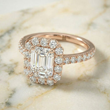 The Fiona Shared Prong Halo Emerald Cut Engagement Ring Setting in 14K Rose Gold