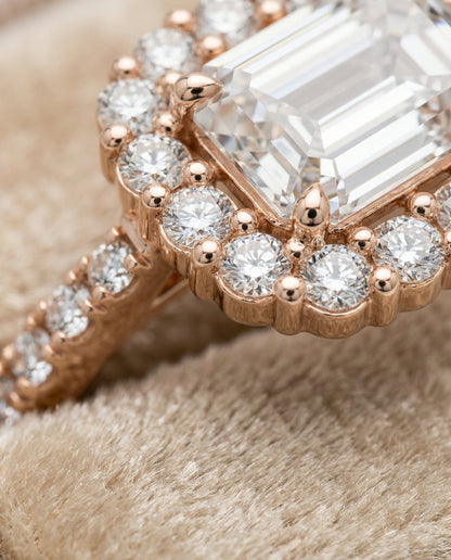 Fiona Select shared prong halo emerald cut emerald cut ring in 14K Rose Gold — detail — RockHer