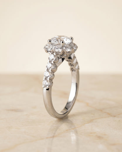 Round Brilliant, Shared Prong Halo Linear Band, in 18K White Gold – angled view | RockHer