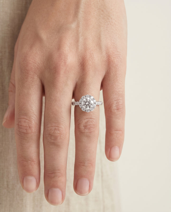Round Brilliant, Shared Prong Halo Linear Band, in 18K White Gold – lifestyle shot | RockHer