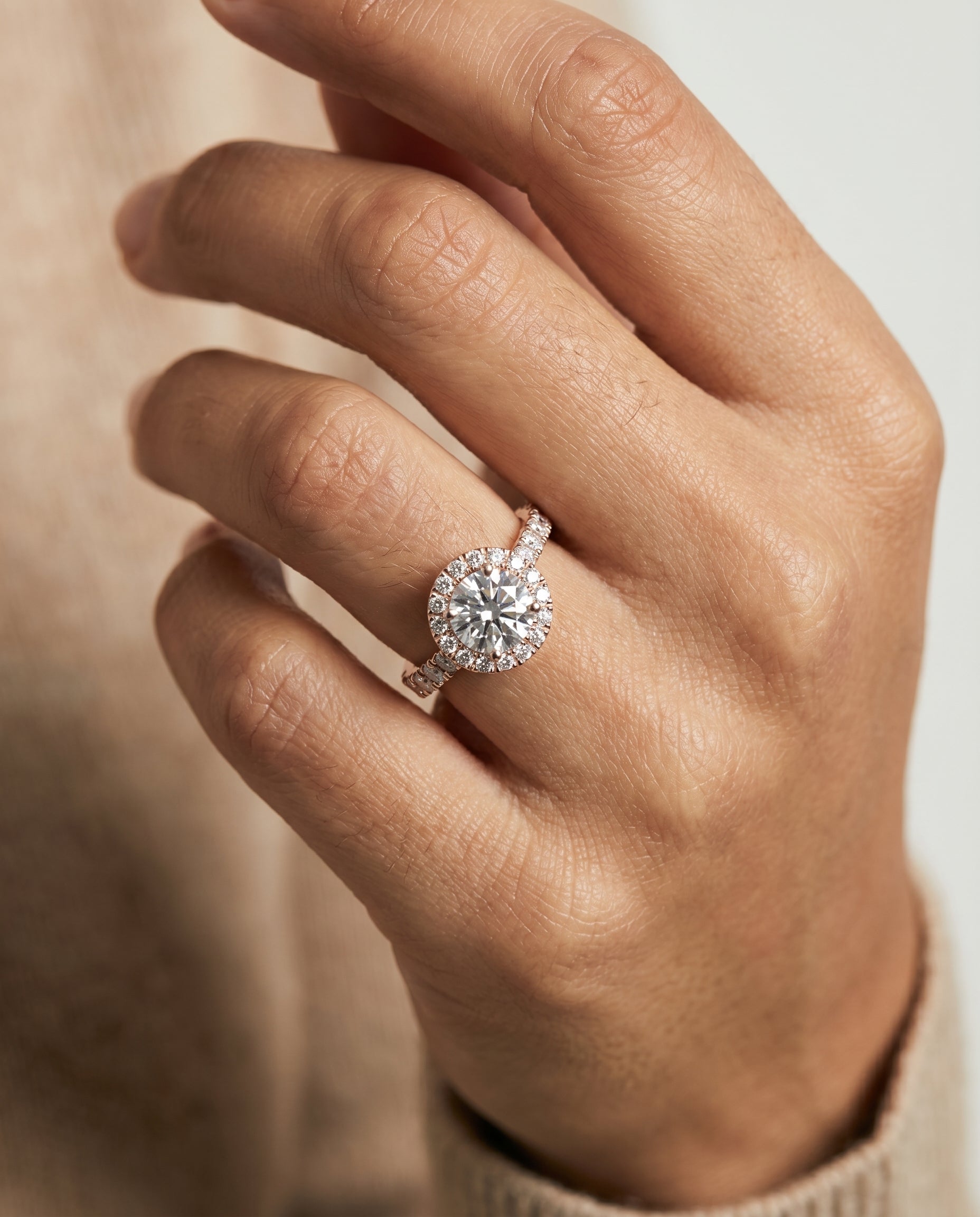 The Lucille engagement ring setting in 14K Rose Gold, shared prong halo linear side set design | RockHer