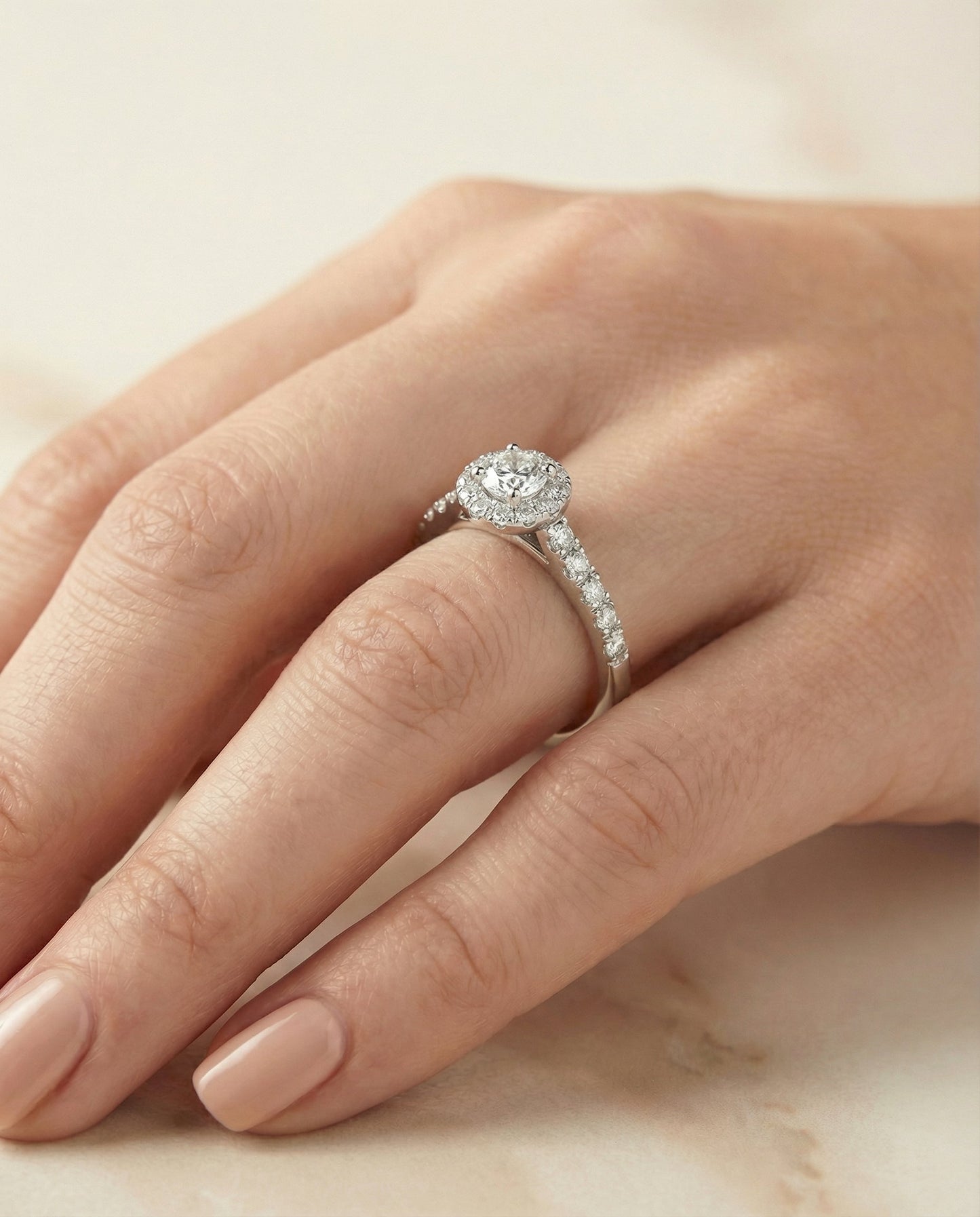 Lucille Select shared prong halo linear side set round ring in 14K White Gold — side — RockHer